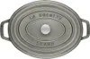 A top-down view of a gray oval Staub cast iron pot. Podgląd zdjęcia produktu