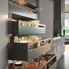 A pull-out pantry system with multiple drawers filled with jars and containers. Produktbild-Vorschau