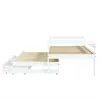 A white wooden bunk bed with a pull-out drawer, shown from the side against a white background. Produktbild-Vorschau