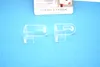 Two transparent plastic hooks are placed on a blue background, with a product information card partially visible at the top. Produktbild-Vorschau