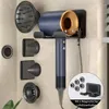 A hair dryer and its accessories are mounted on a wall. Produktbild-Vorschau