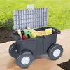A garden cart filled with gardening tools and supplies is shown outdoors on a patio. Produktbild-Vorschau