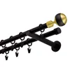 A close-up, angled view of a double curtain rod with decorative finials. Produktbild-Vorschau