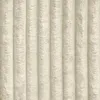 A close-up, full-frame shot of a beige upholstered bed frame with vertical tufting. Produktbild-Vorschau