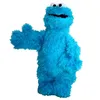 A blue plush toy character with googly eyes and a wide mouth, standing against a white background. Produktbild-Vorschau