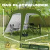 A green pop-up pavilion set up in a grassy outdoor area with trees in the background. Camping chairs and a table are inside the pavilion. Anteprima dell’immagine prodotto
