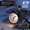 A hand activating the night light on a vintage alarm clock next to a sleeping couple. Anteprima dell’immagine prodotto