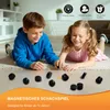 Two children playing with a magnetic chess game on the floor. Produktbild-Vorschau