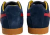 The back view of two blue suede sneakers with red stripes and gum soles. Náhled obrázku produktu