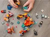 Hands assembling a LEGO set on a wooden floor. Náhled obrázku produktu