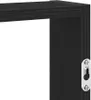A close-up view of a black wooden shelf with a metal hanging bracket attached. Náhled obrázku produktu