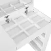 A close-up view of the interior of a white vanity table with multiple compartments. Anteprima dell’immagine prodotto