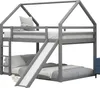 A grey wooden bunk bed with a house-shaped frame, a slide, and a ladder, set against a white background. Podgląd zdjęcia produktu