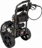 A black and gray gas-powered pressure washer with a hose reel and spray gun, shown from a diagonal front-left perspective against a white background. Náhled obrázku produktu