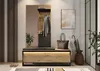 An entryway with a bench, mirror, coat rack, and accessories. Produktbild-Vorschau