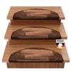 Three wooden steps with brown carpeted treads, each with a dark border. A German company logo is visible on the bottom right. Produktbild-Vorschau