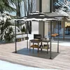 A winter scene with a gazebo set up on a wooden deck, featuring a grill and accessories. Voir les images du produit