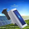 A solar-powered outdoor light with a solar panel is shown against a backdrop of solar panels and a blue sky. Produktbild-Vorschau