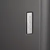 A close-up of a gray suitcase with the brand logo. Produktbild-Vorschau