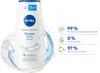 A bottle of NIVEA Creme Soft & Mandel-Öl body wash is shown with water splashes around it. To the right of the bottle are three icons with text indicating product features. Produktbild-Vorschau