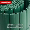 Close-up view of a rolled-up green PVC privacy screen, showing its ribbed texture and hollow internal structure. A logo and text overlay are present. Anteprima dell’immagine prodotto