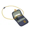 A navy blue neck pouch with a yellow lanyard and a key attached. Voir les images du produit