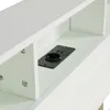 A close-up view of a white shelf with a black charging port that has USB ports and a circular opening. Produktbild-Vorschau