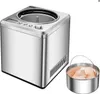 A silver ice cream maker and a metal bowl containing chicken pieces are shown against a white background. Produktbild-Vorschau
