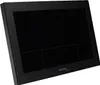 A black digital clock with a screen and touch buttons. Produktbild-Vorschau
