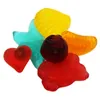 A collection of colorful gummy candies in various shapes. Anteprima dell’immagine prodotto