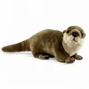 A plush otter toy lying on a white background. Anteprima dell’immagine prodotto