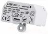 A close-up, angled view of a white electronic device with text and symbols printed on it, mounted on a gray bracket. Produktbild-Vorschau