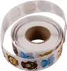 A roll of round stickers with cartoon animal faces on a white background. Produktbild-Vorschau