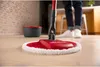 A person is using a Vileda Spin & Clean floor mop in a kitchen or living area. Podgląd zdjęcia produktu