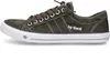 A side view of a green sneaker on a white background. Voir les images du produit