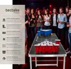 People playing beer pong at a party. Náhled obrázku produktu
