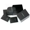 A set of Emporio Armani watch packaging, including boxes and booklets, on a white background. Náhled obrázku produktu