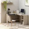 A corner desk with a computer and chair in a room. Náhled obrázku produktu