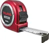 A red Tajima tape measure with its tape extended. Voir les images du produit