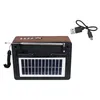 The back view of a portable radio with a solar panel and a USB charging cable. Náhľad obrázku produktu
