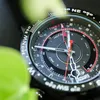 A close-up of a Timex watch with a compass and tide indicator. Podgląd zdjęcia produktu