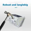 A hammer is shown striking a solar-powered outdoor light, demonstrating its robustness. Produktbild-Vorschau