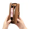 Hands holding an open brown wallet with money and earphones inside. Produktbild-Vorschau
