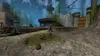 A scene from a video game with a rocky, industrial environment and some small, brown, round creatures in the foreground. Produktbild-Vorschau