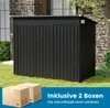 A dark gray metal garden shed is shown outdoors on a grassy lawn, with a stone building in the background. Two cardboard boxes are in the foreground, and a blue overlay at the bottom contains text. Produktbild-Vorschau