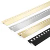 Four L-shaped metal profiles with holes, arranged diagonally on a white background. Produktbild-Vorschau