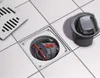 A close-up view of a floor drain system with its internal components visible, set against a tiled floor. Náhled obrázku produktu