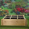 A wooden raised garden bed with a black liner is shown in front of a colorful garden mural. Produktbild-Vorschau