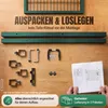 Einzelne Teile eines Gartentores auf Tisch mit Montagevorlage Produktbild-Vorschau