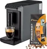 A coffee machine with a sample pack of coffee beans and a glass of coffee. Produktbild-Vorschau